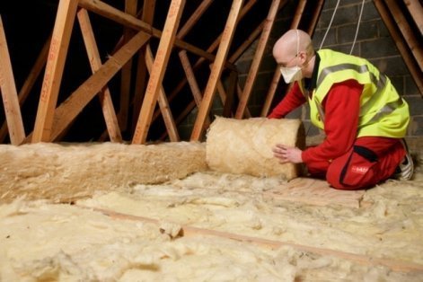 Loft insulation being laid in Bristol